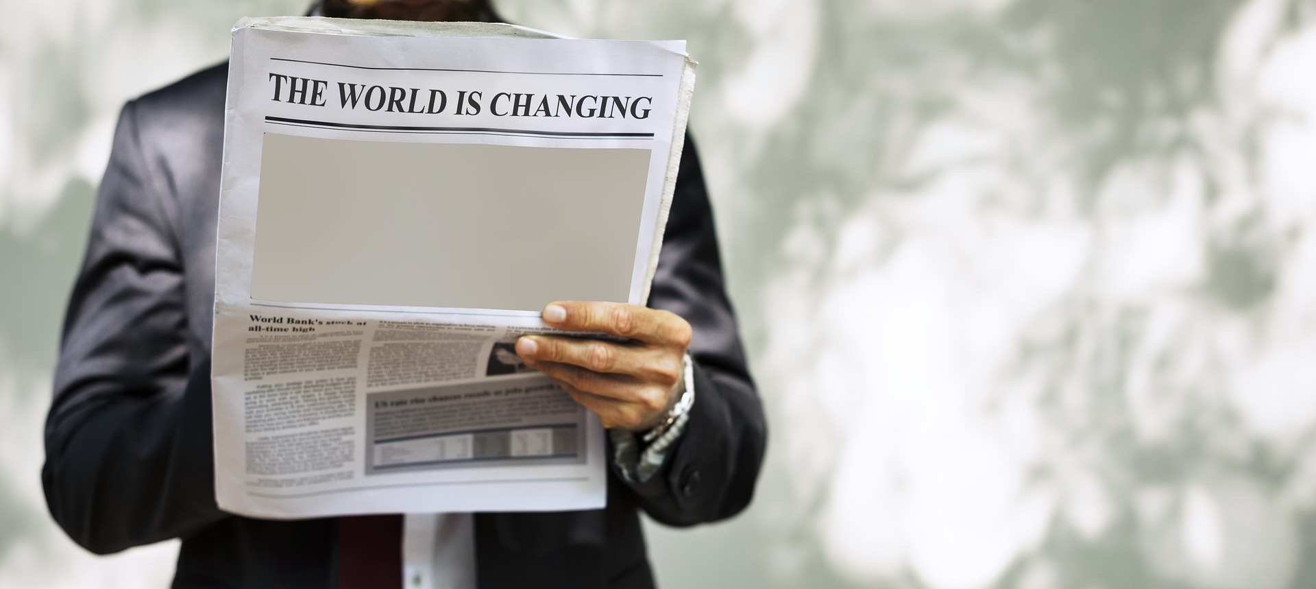 "The World is Changing" newspaper headline
